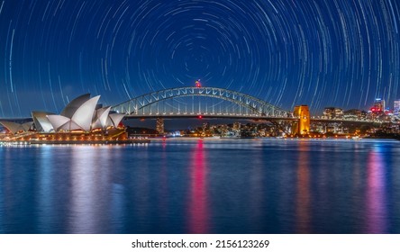 Star trails in the sky over Sydney Harbour NSW Australia startrails. lovely patterns and beautiful colours of the night.