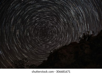 Star Trails Upon Rocks With Full Circle Around Polaris  