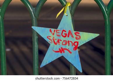 Star With Vegas Strong Hashtag Attached To A Fence