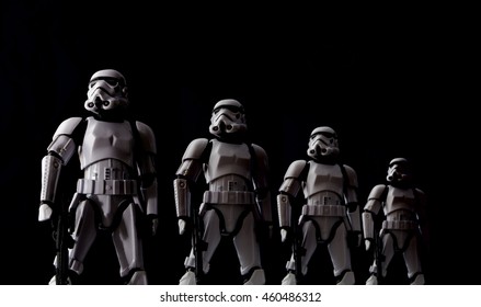 Star Wars Stormtroopers lined up with dramatic lighting - Hasbro Black Series 6 inch action figures.