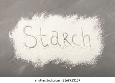 Starch Scattered On Grey Background. Inscription Starch, Food Ingredient For Baking.