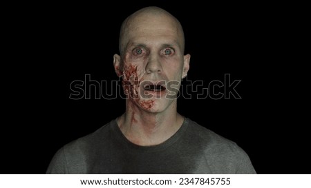 Staring Bleeding Male Zombie with wounds  