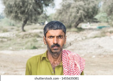 Staring Poor Farmer In A Village Looks So Worried Or Sad 