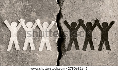 A stark image of two groups of paper people, one white and one black, separated by a deep crack in a textured surface, representing social division and conflict.