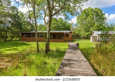 Starke, FL USA - June 26 2022: Big open area in a backyard of a modular home