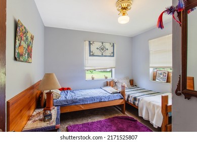 Starke, Florida USA - June 25, 2022: Spare bedroom with two twin beds