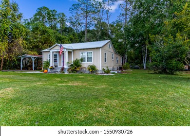 Starke, Florida / USA - November 5 2019: Simple one story home in the country