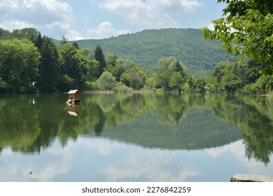 The Starozagorski bani lake in the summer - a place in Bulgaria for tourism and recreation with hot springs and beautiful nature. Horizontal image with copy space