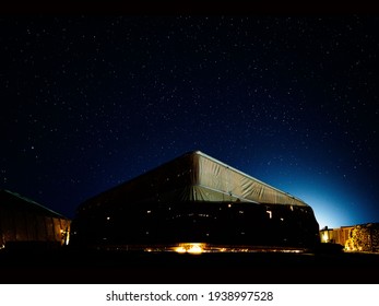 Starry Background With Military Aircraft Hanger
