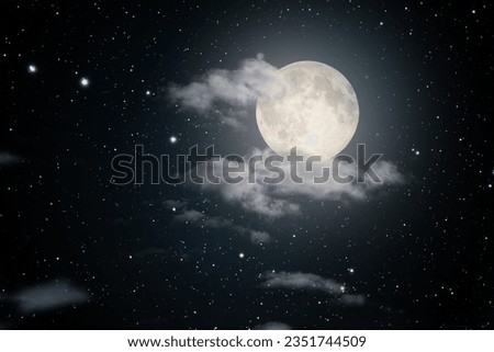 Starry full moon night sky with some clouds. Used part of a NASA photo for the stars.
