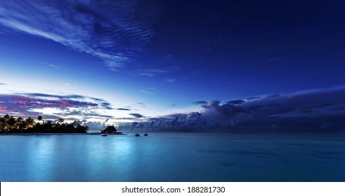 Starry Night On Maldives, Dark Blue Night Sky Over Beach Resort, Beautiful Nighttime Seascape, Luxury Summer Vacation And Tourism Concept 