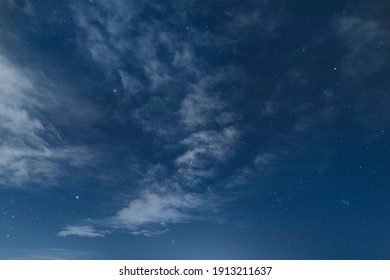 Starry Night Sky With Clouds