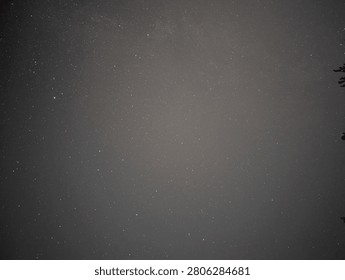 A starry night sky filled with countless stars on a dark background