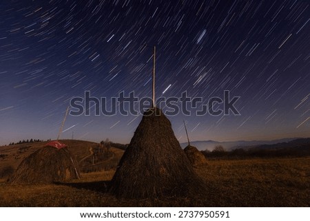 Starry Night Sky over Haystack in the Carpathian Mountains, Western Ukraine
The rural mountain landscape under a dark sky full of stars creates a peaceful and atmospheric scene. The image combines astrophotography, countryside life, and the natural beauty of the Ukrainian Carpathians. Ideal for travel, nature, astronomy, rural lifestyle, and cultural landscape projects.