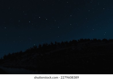 Starry night sky at summer near gulf - Shutterstock ID 2279608389