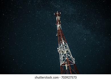 Starry sky and a communication tower. Starry night with Milky Way Galaxy.  - Powered by Shutterstock