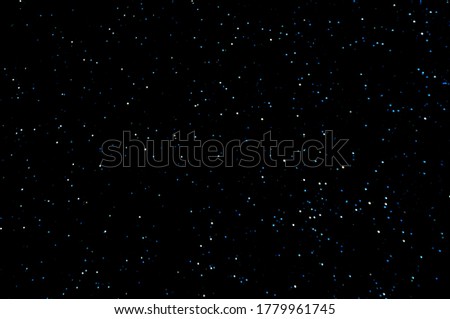 starry sky and constellations above the city