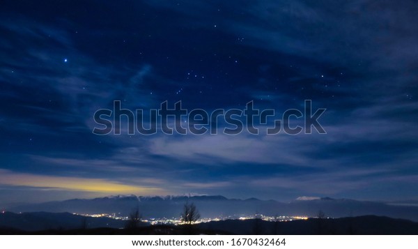 Starry sky and night view from the mountain in the\
Southern Alps