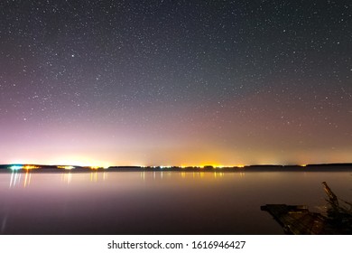 Starry sky over the lake. Timelapse Starry sky background video stars in the night sky and the Milky Way.