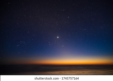 Starry sky, planet Venus, sunset landscape of the Pacific Ocean - Shutterstock ID 1745757164