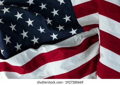 Stars displaying on waving American flag in filled frame layout 