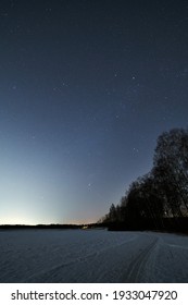 Stars And Night Sky Over Snowy Field                     