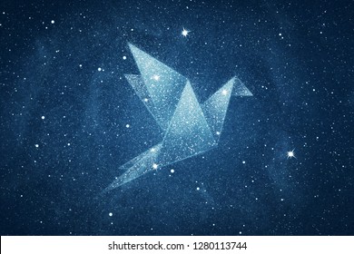 Stars In Origami Bird Shape Over Blue Night Sky Background