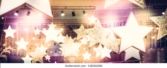 Stars spotlights soffits as finest hour celebrity show stage background with golden pink lights