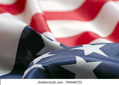 Stars and Stripes Flag background; rippling red white and blue silken American flag
				