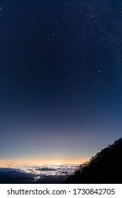 Stars With Sunrise In Beautiful Blue Hour From Top Of The Hill.