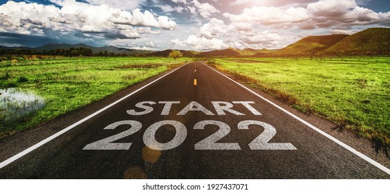 Start 2022 Written On Highway Road In The Middle Of Empty Asphalt Road And Beautiful Blue Sky. Concept For Vision New Year 2022.