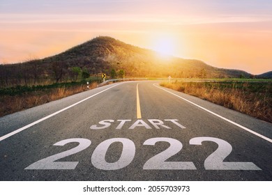 Start 2022 Written On Highway Road In The Middle Of Empty Asphalt Road Of Asphalt Road At Sunset.Concept Of Planning And Challenge, Business Strategy, Opportunity ,hope, New Life Change.for 2021-2022.