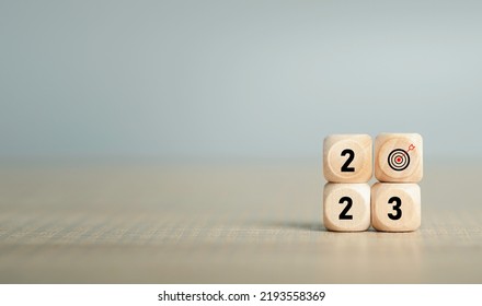 Start 2023 concept, 2023 years Target successful in wood cube for beginning new year for planning. background for the happy new years for text with copy space. - Shutterstock ID 2193558369