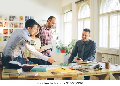 Start up business. Group of young architect at office - Shutterstock ID 345402329