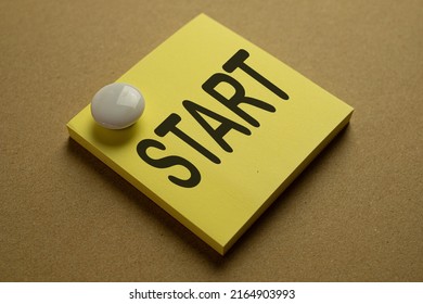  start business,new job,education,new target,career concept.,START word on yellow stickynote stick on board.