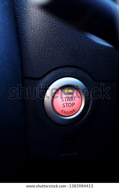 Start button in car\
closeup.