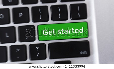 Start. Computer keyboard with green GET STARTED button