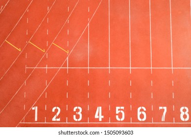 Start And Finish Point Of Race Track Or Athletics Track Start Line With Lane Numbers Top View Drone Shot High Angle View.