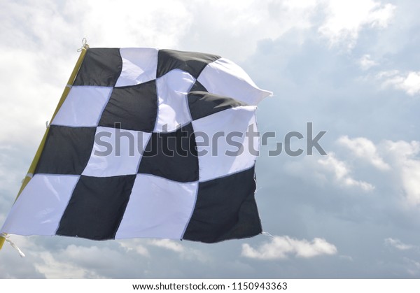 start flag against the\
sky