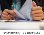 Start up learning for Document report business note in meeting room concept: Businessman manager hands writing for reading, signing in paperwork or documentation files at corporate on office desk
