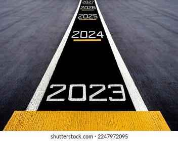Start move forward the future to new year two thousand twenty three (2023), painted on a runway of an aircraft carrier