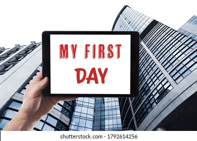 Start New Job. Man Holding Tablet With Text My First Day Against Modern Building, Closeup