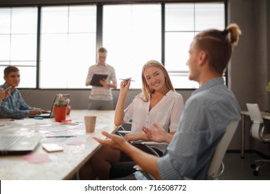 Start Up Programming Team. Website Designer Working Digital Tablet Dock Keyboard And Computer Laptop With Smart Phone And Compact Server On Mable Desk,light Effect, Red Cups.