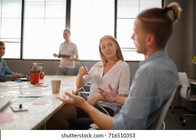 Start Up Programming Team. Website Designer Working Digital Tablet Dock Keyboard And Computer Laptop With Smart Phone And Compact Server On Mable Desk,light Effect, Red Cups.