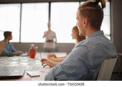 Start Up Programming Team. Website Designer Working Digital Tablet Dock Keyboard And Computer Laptop With Smart Phone And Compact Server On Mable Desk,light Effect, Red Cups.