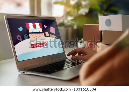 Start to Selling Online Concept. Young Woman Using Computer laptop to Open her Own Shop in Online Marketplace. Internet that help People to Work From Home