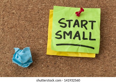 Start Small -  Business Advice - Handwriting On Green Sticky Note