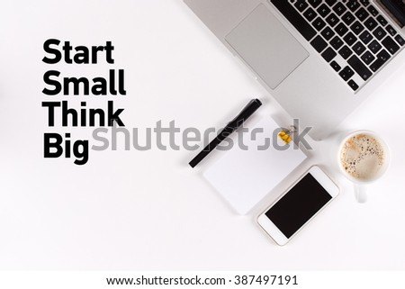 Start Small Think Big text on the desk with copy space