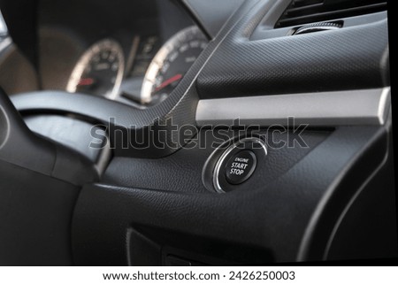 Start stop button in the car.