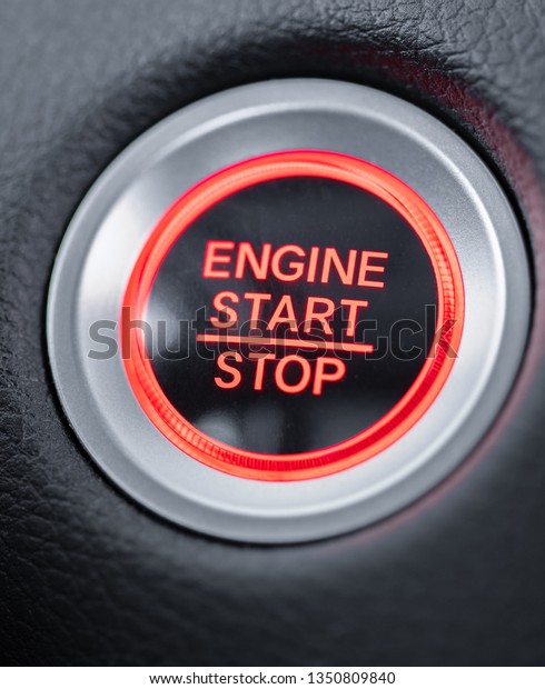 start stop car engine\
glowing red button